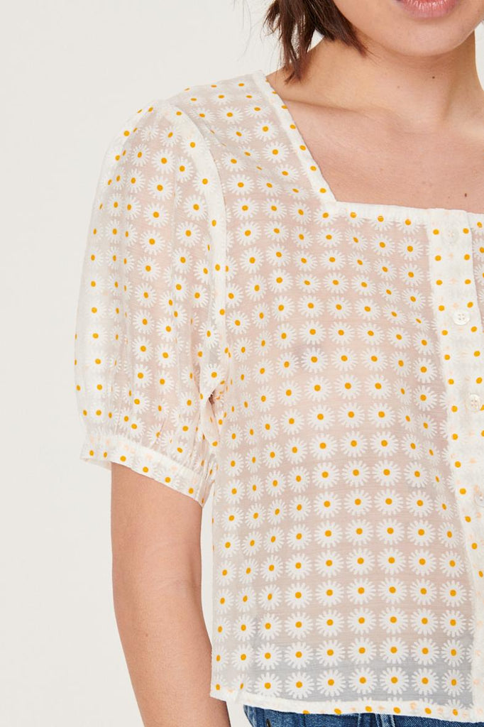 top camicetta misto cotone, modello cropped velata con stampa margherite e maniche corte a palloncino
