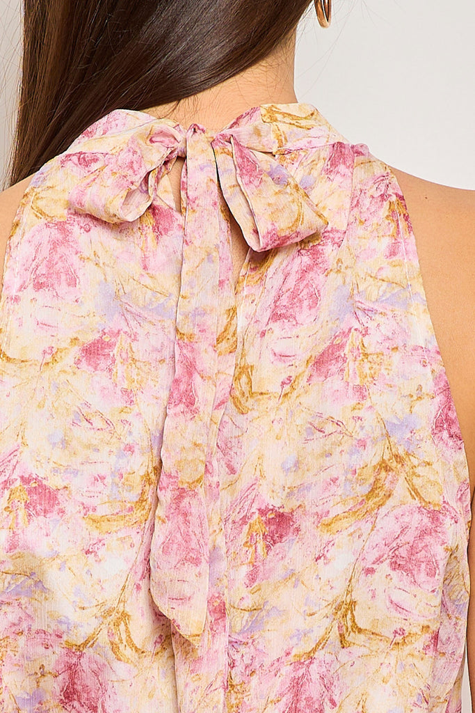 vestito motivo floreale color pastello, tessuto voile, scollo all'americana e fiocco dietro il collo